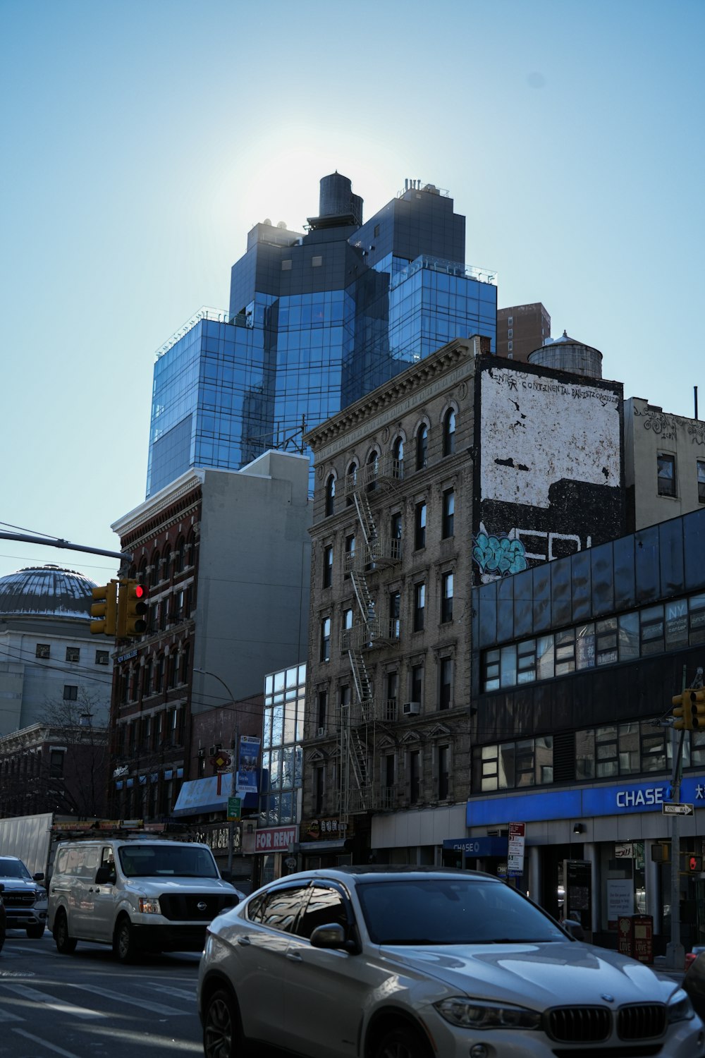 a city street filled with lots of tall buildings