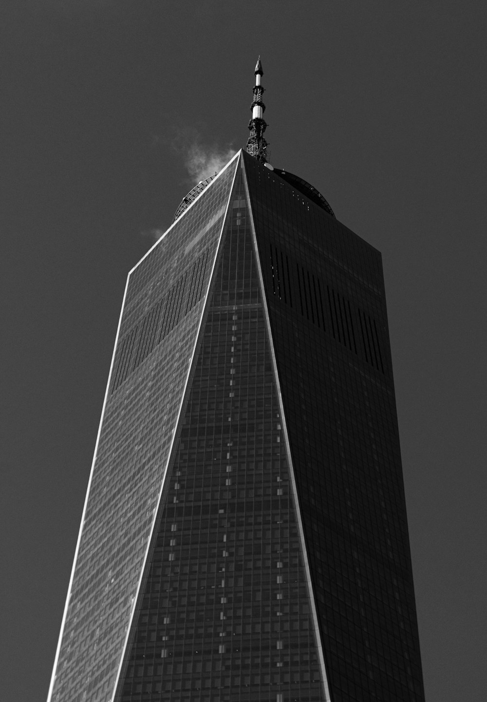 a black and white photo of a tall building