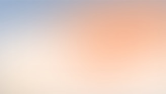 a blurry photo of a plane flying in the sky