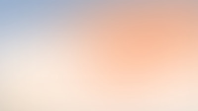 a blurry photo of a plane flying in the sky