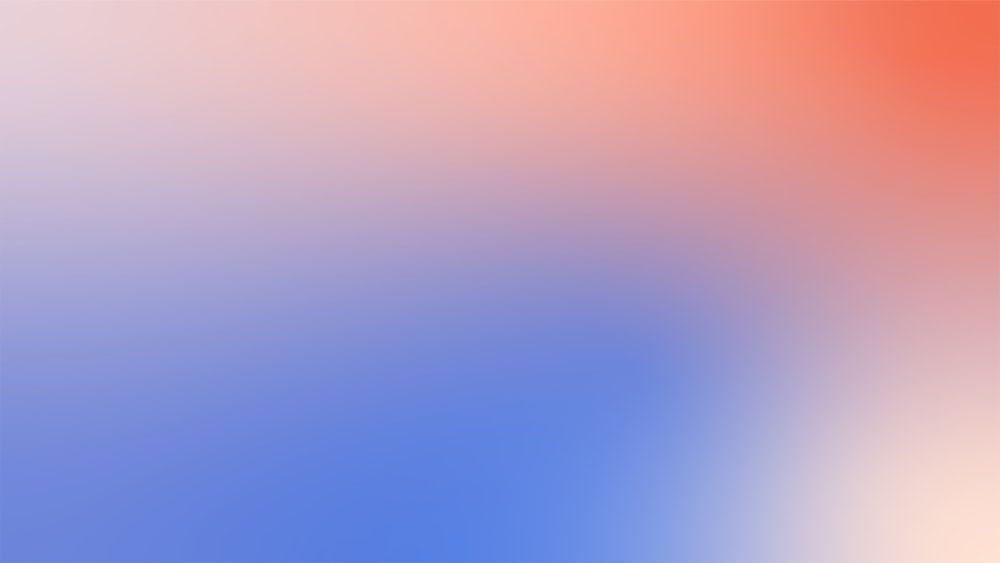 a blurry image of a red, white and blue background