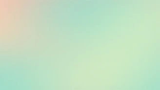 a blurry image of a blue and green background