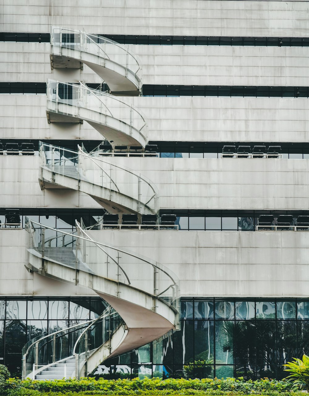 a building with a spiral staircase in front of it