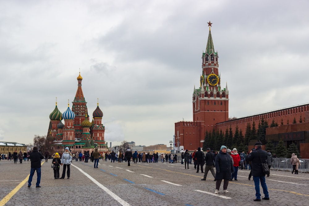 a group of people standing in front of a building