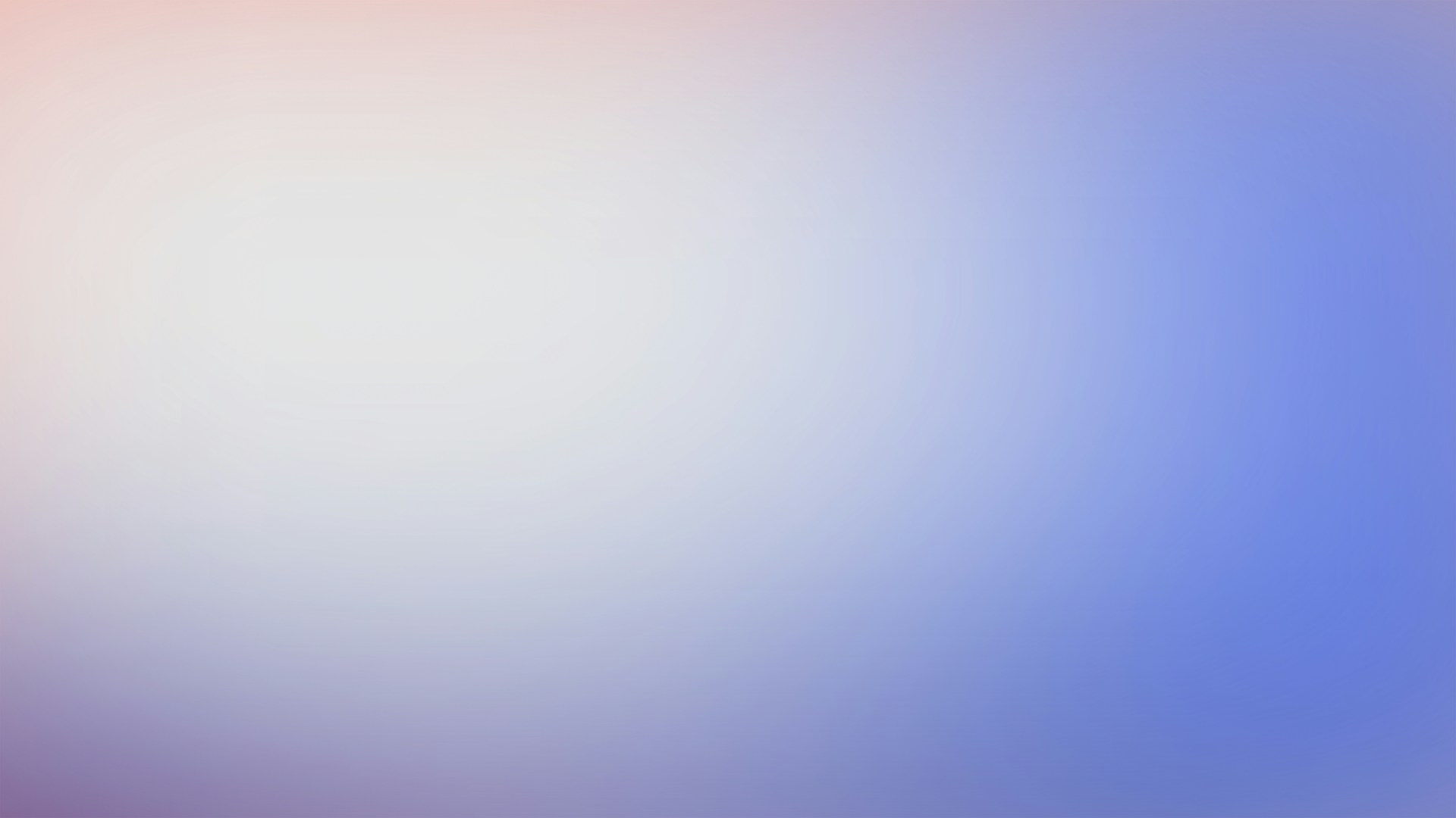 a blurry image of a blue and pink background