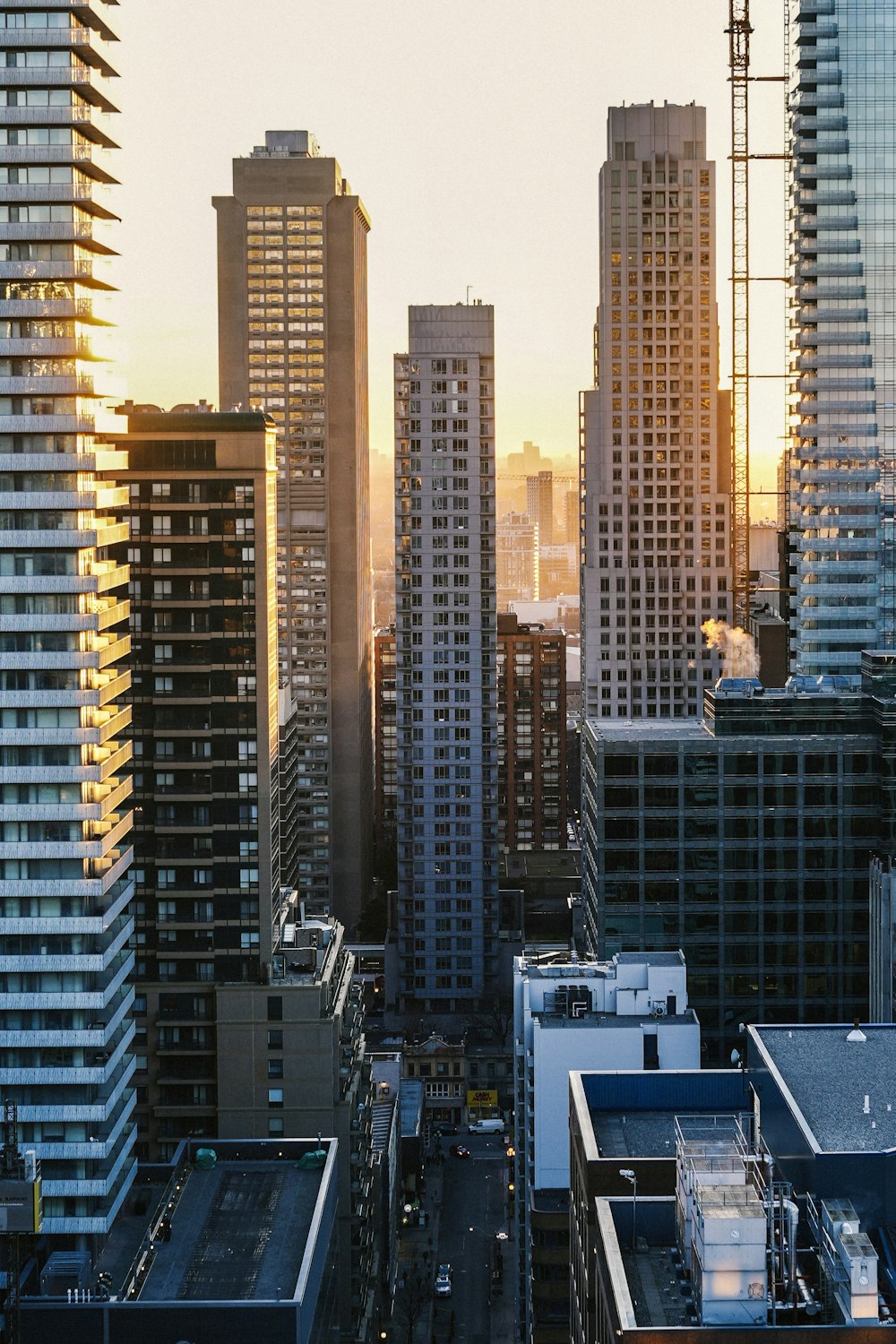 a view of a city with tall buildings