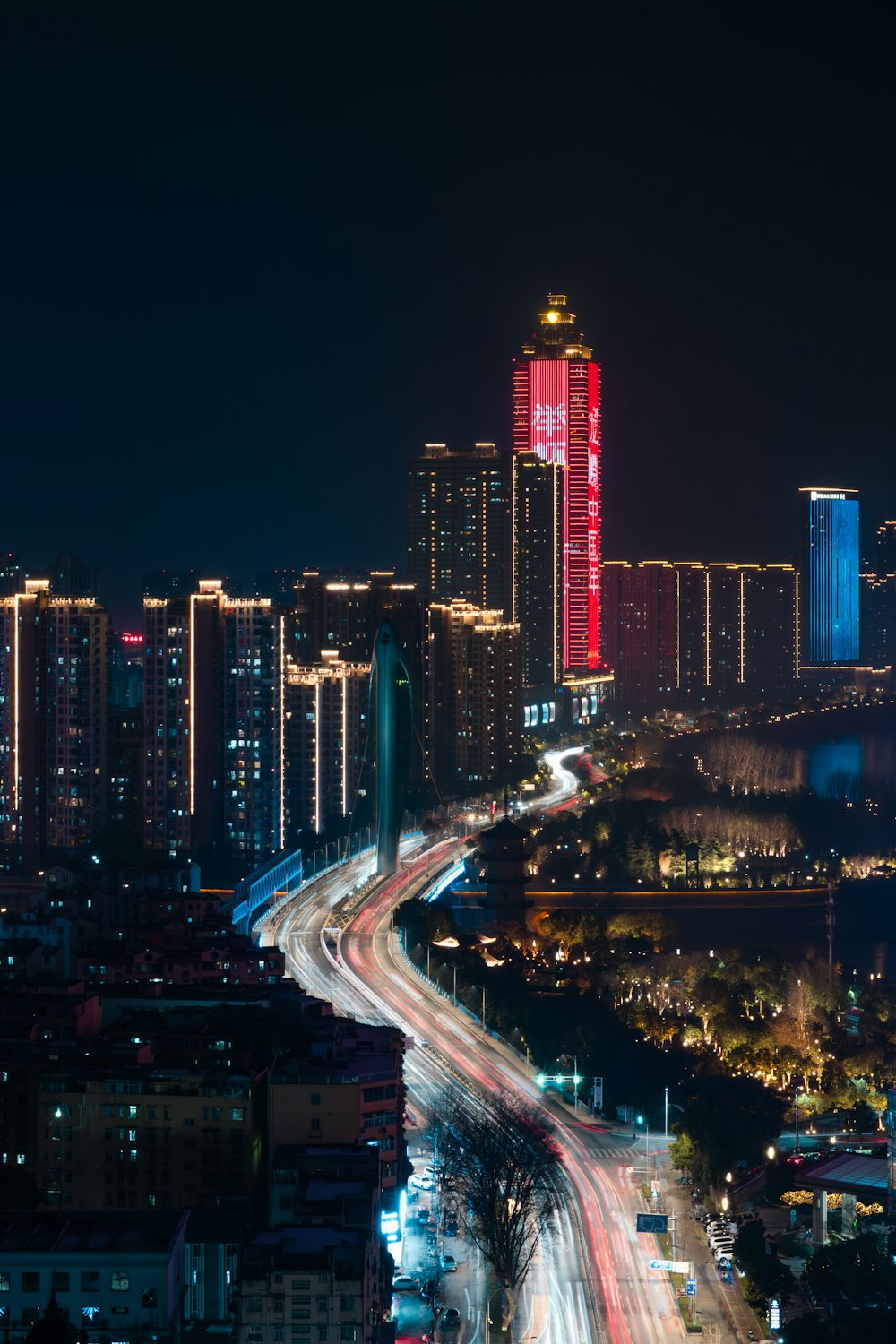 a city at night with a very long exposure