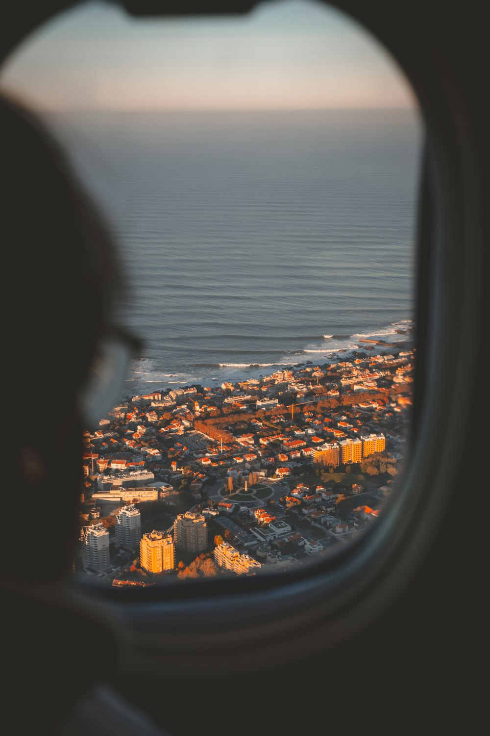 a view of a city from an airplane window