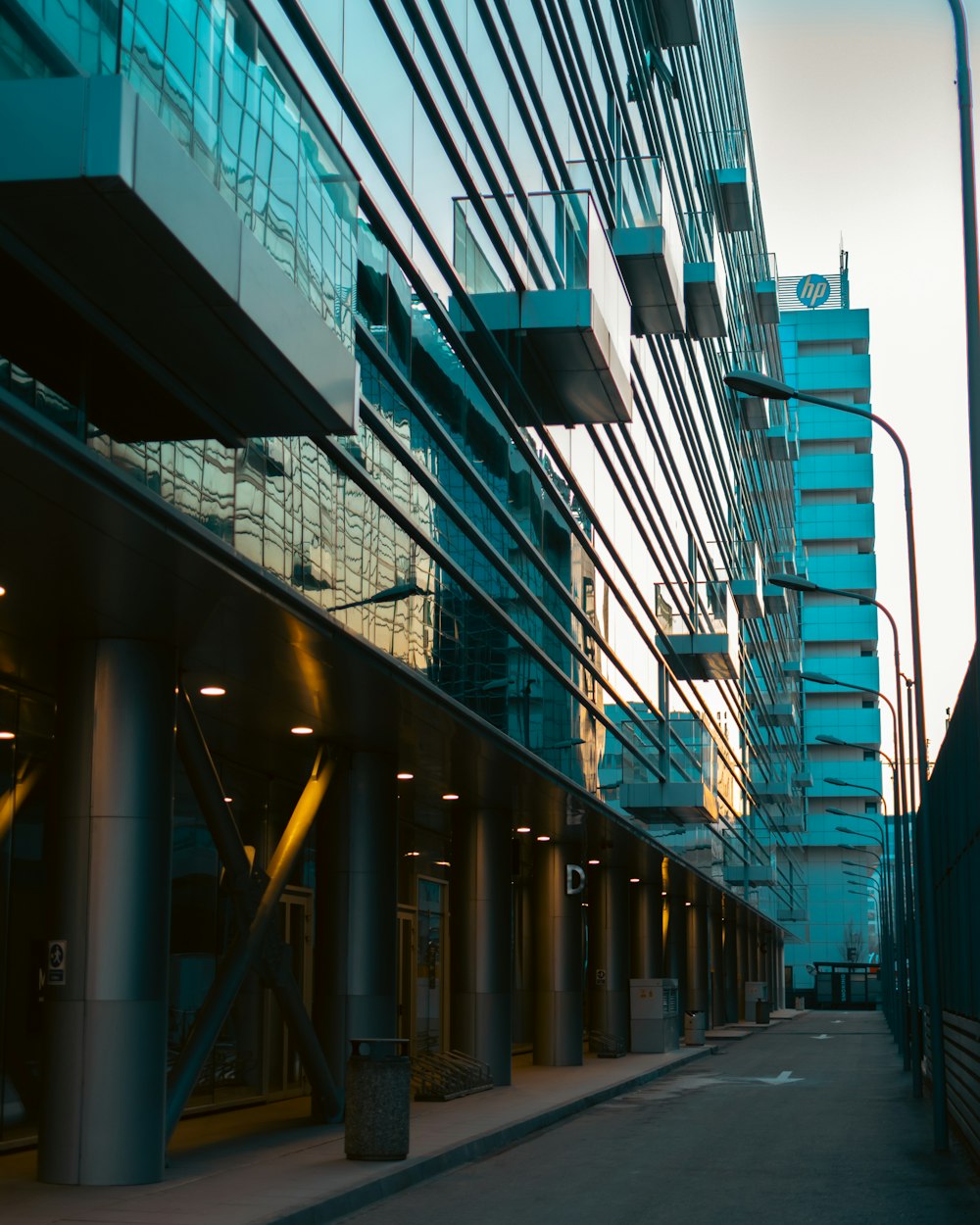 a city street lined with tall buildings next to each other