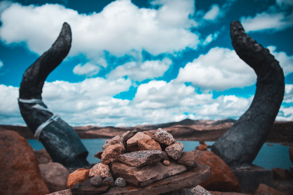 a pile of rocks sitting on top of a pile of rocks