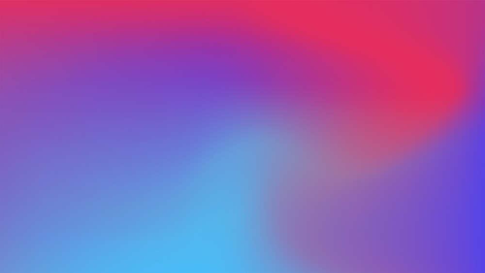 a blurry image of a blue and red background