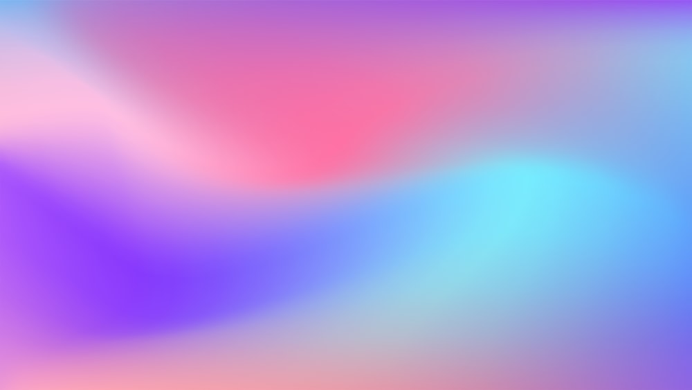 a blurry image of a blue and pink background