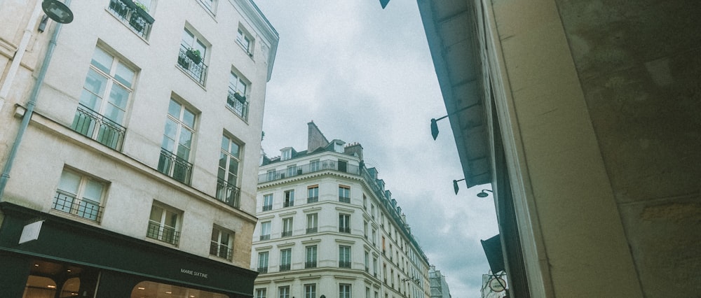 a city street filled with lots of tall buildings