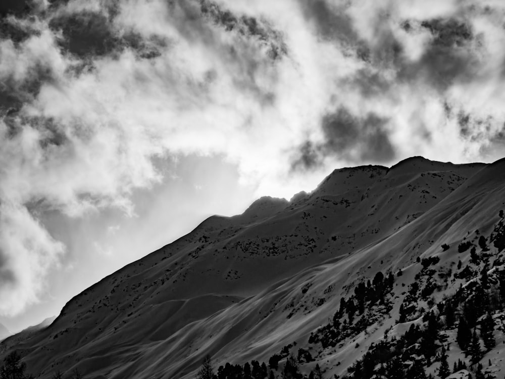 a black and white photo of a mountain