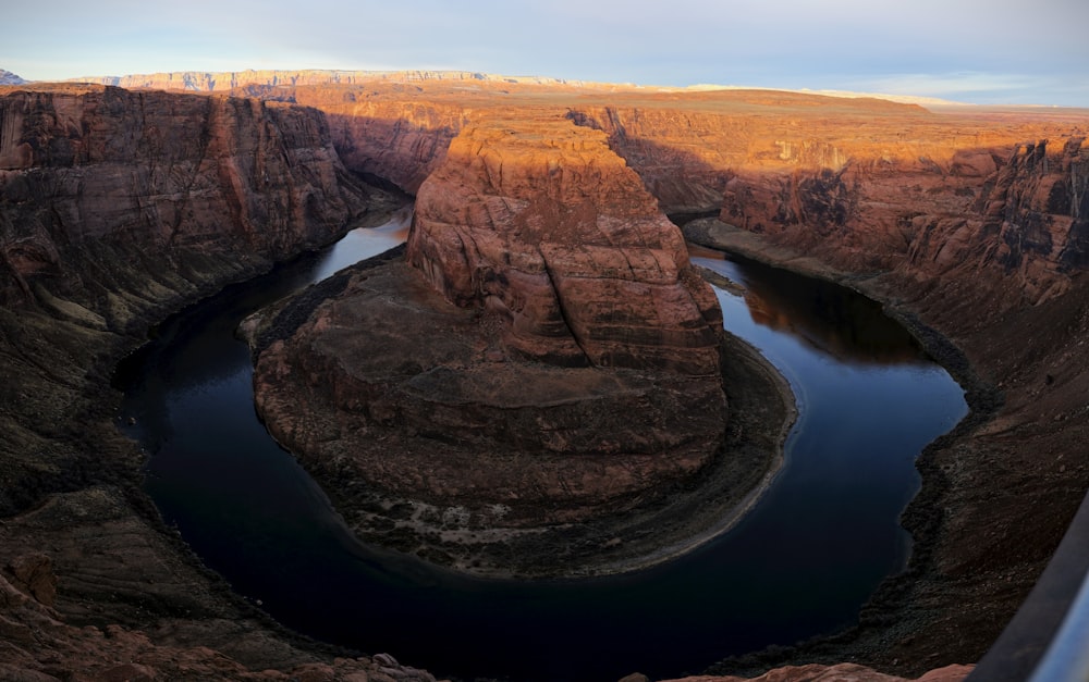 a river in a canyon surrounded by mountains