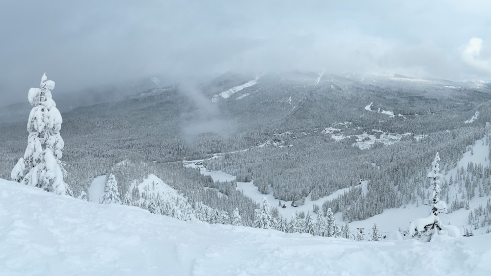 a person on a snowboard on a snowy mountain