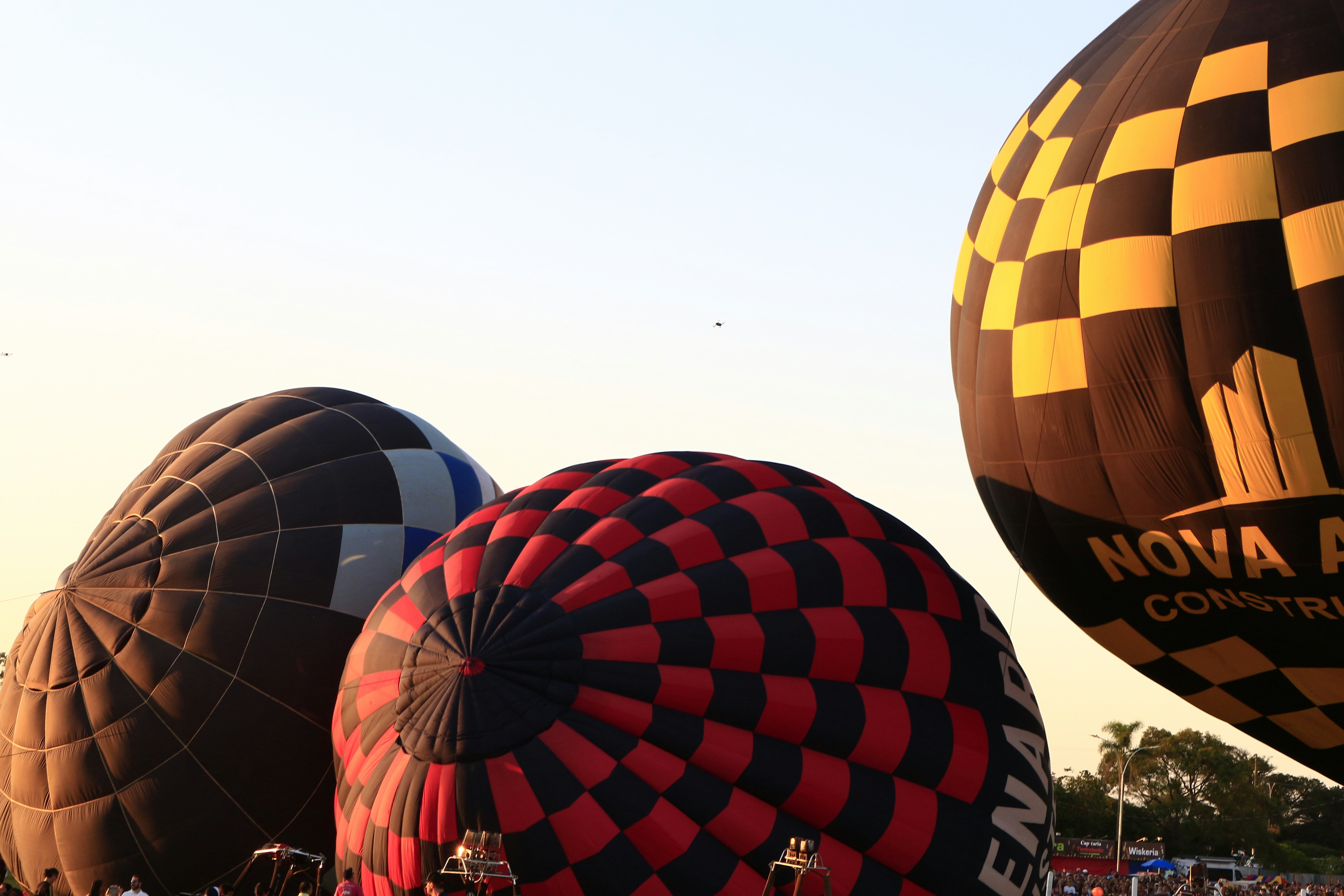 a group of hot air balloons flying in the sky