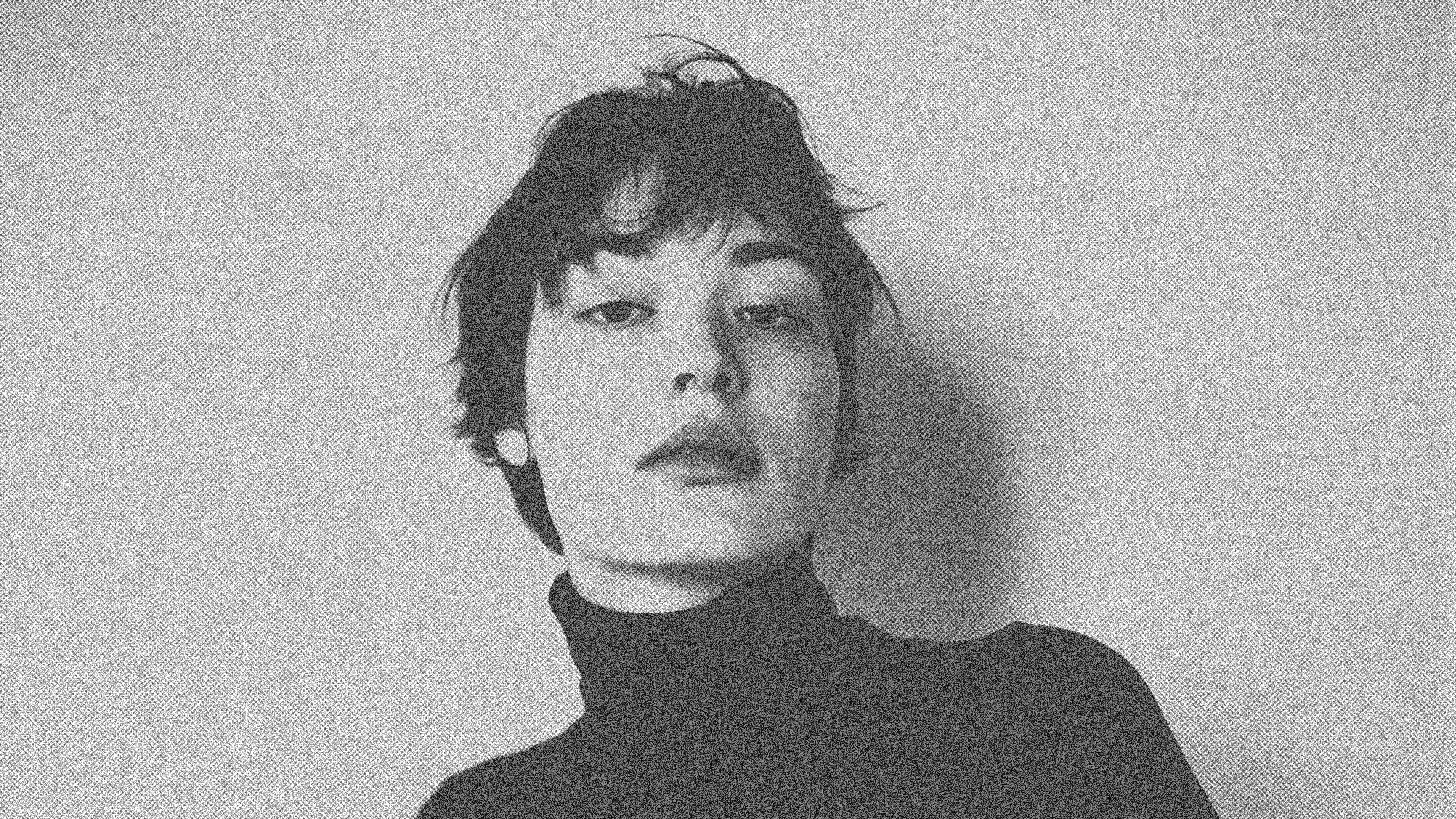 a black and white photo of a woman