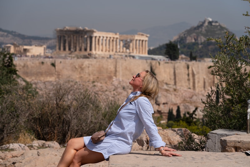 Mature Greek beauty basking under the sky
