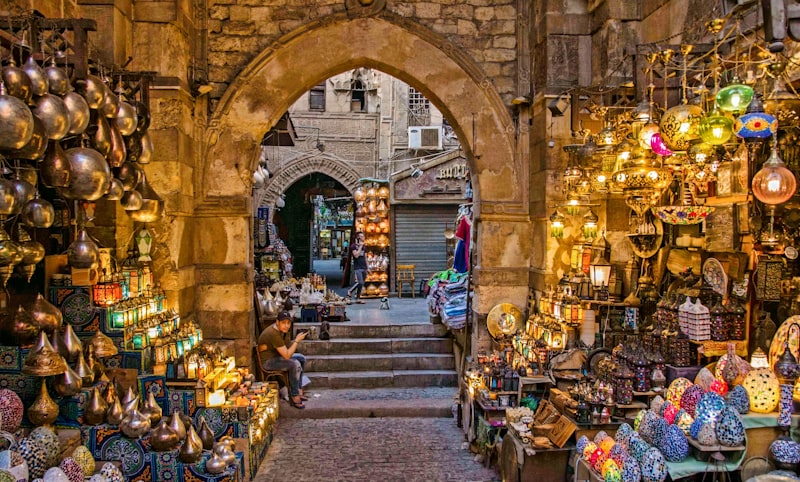 Narrow lane in Khan el-Khalili bazaar with crafts and lanterns