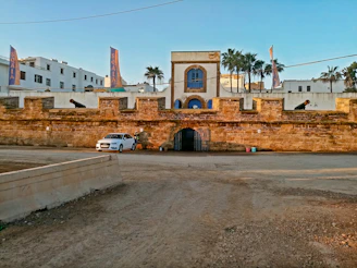 a car is parked in front of a building
