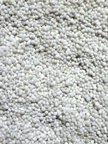 a close up of a bunch of white balls