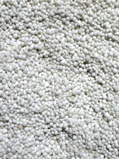 a close up of a bunch of white balls
