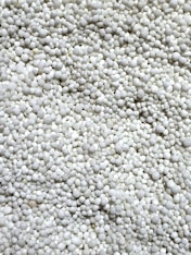 a close up of a bunch of white balls