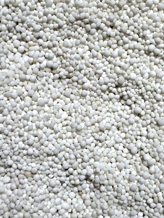 a close up of a bunch of white balls