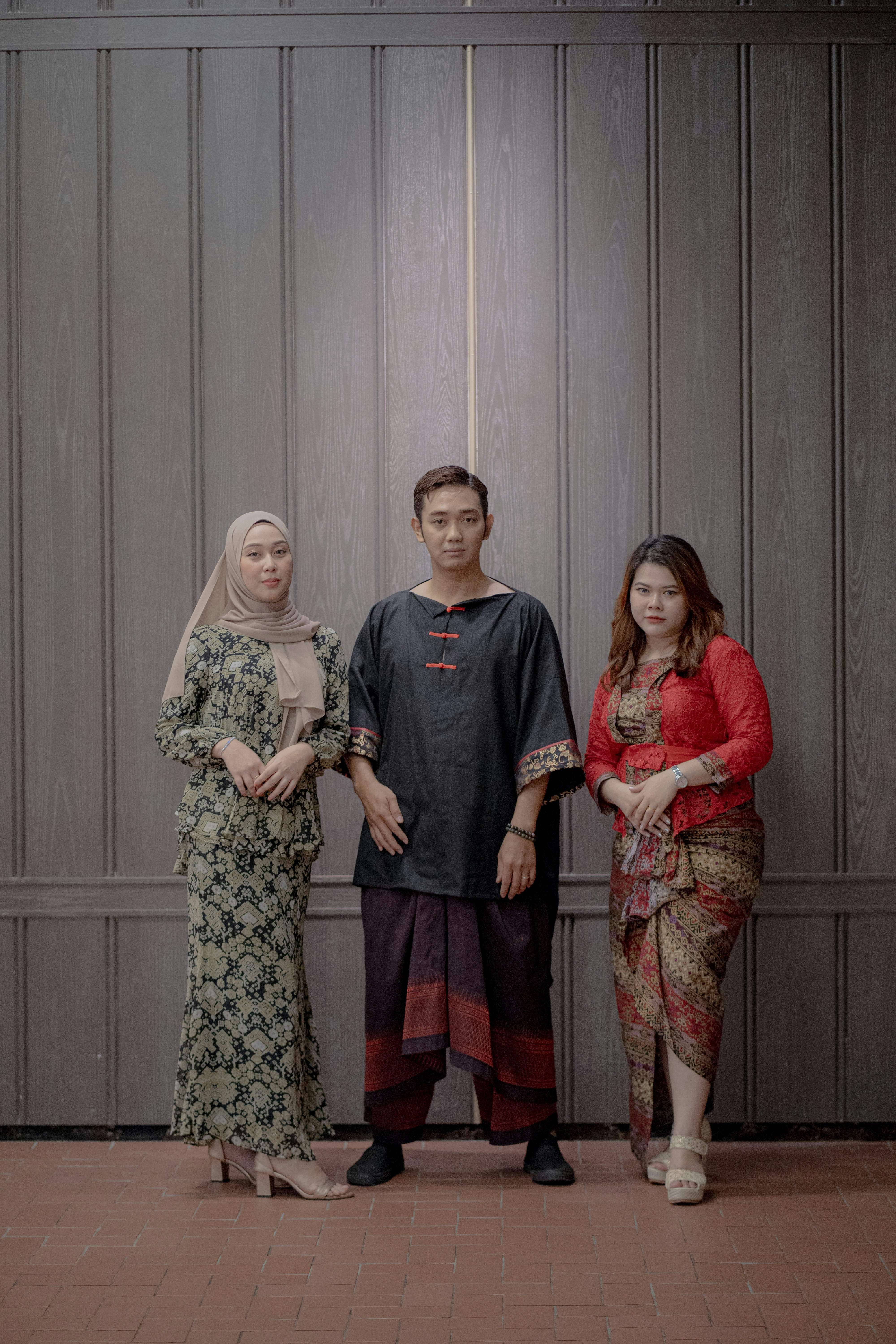 a group of malaysian is getting ready for photoshoot.