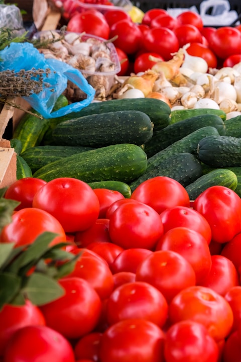 a bunch of vegetables that are on display