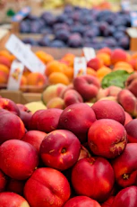 a pile of fruit sitting on top of a table