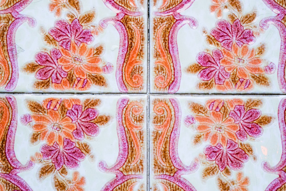 a close up of a tile with a design on it