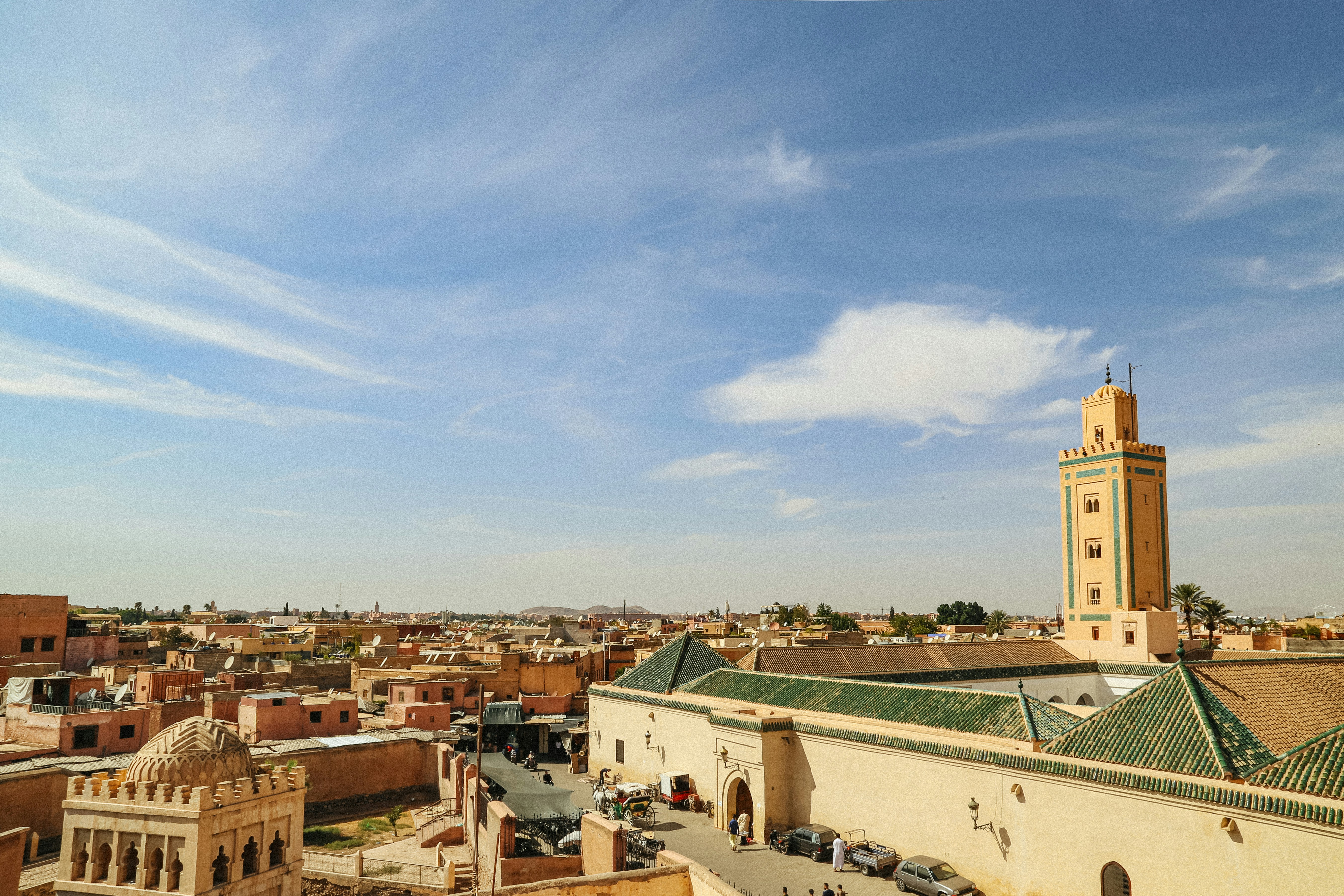 A view of a city with tall buildings and a clock tower