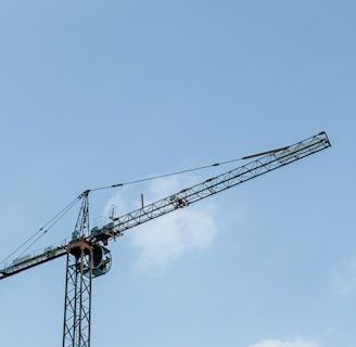 a crane that is sitting on top of a building