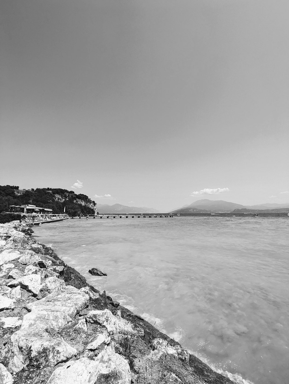 a black and white photo of a body of water