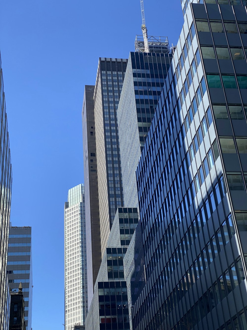 a group of tall buildings next to each other