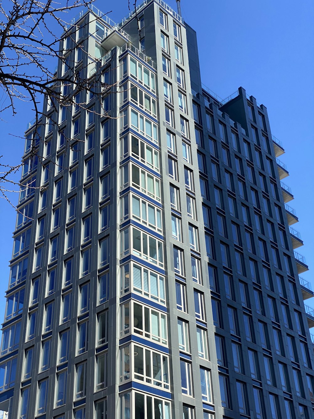 a very tall building with a clock on it's side