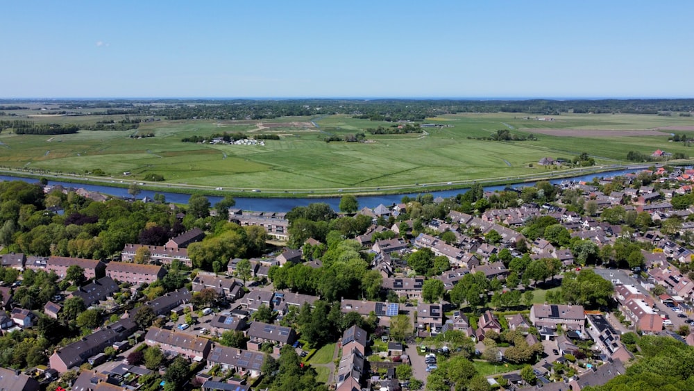 an aerial view of a city with a river running through it