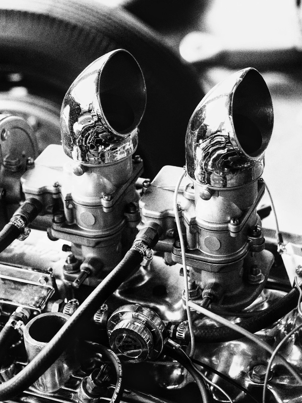 a black and white photo of a car engine