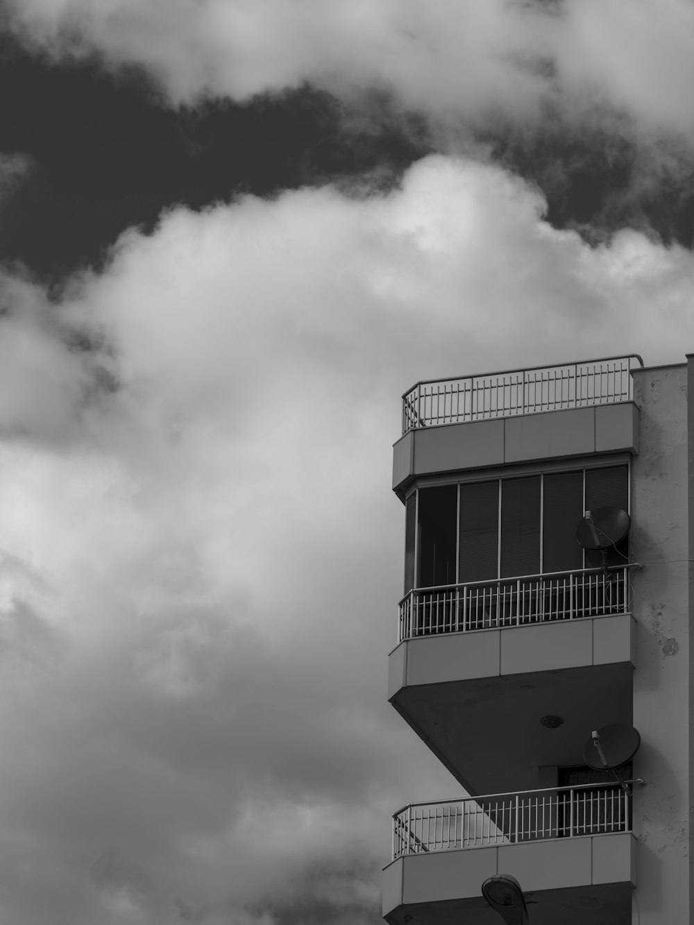 a black and white photo of a tall building