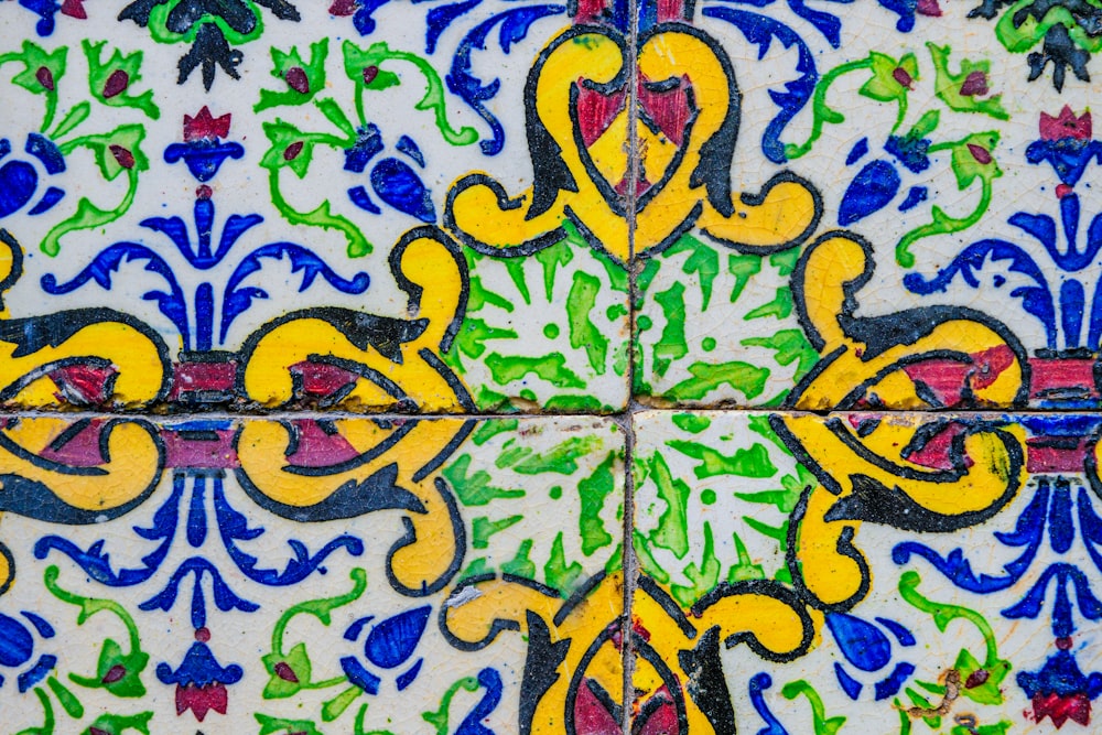 a close up of a colorful tile pattern