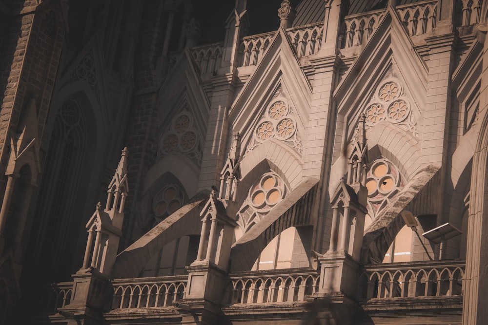 a large cathedral with a clock on the side of it