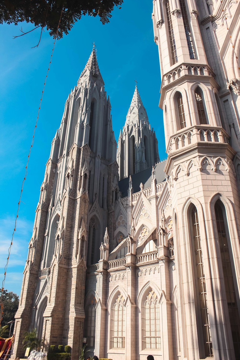 a large cathedral with a clock on the front of it