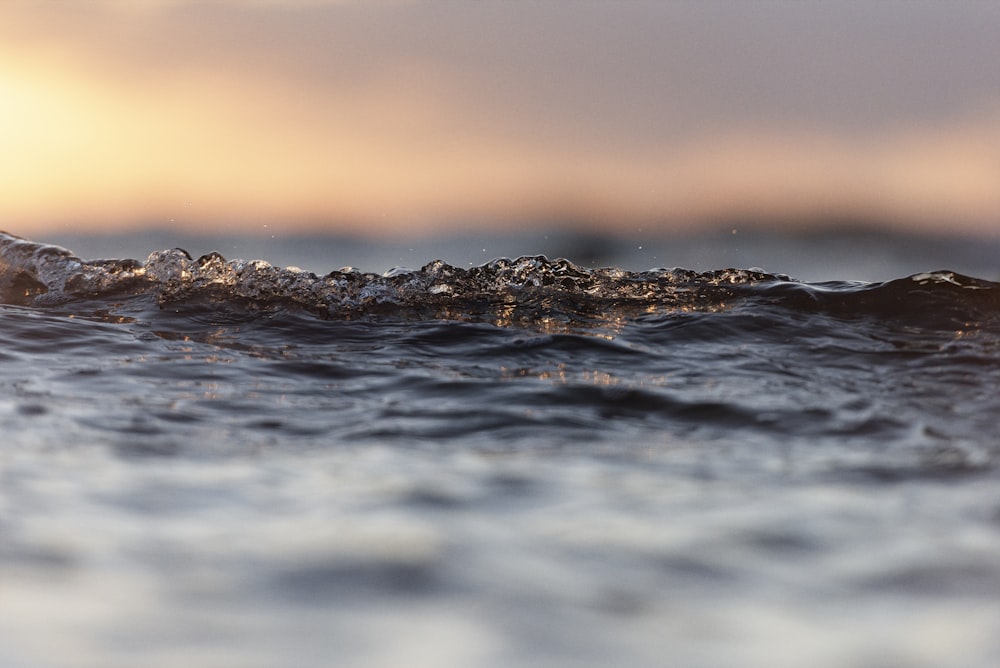 a blurry photo of a wave in the ocean