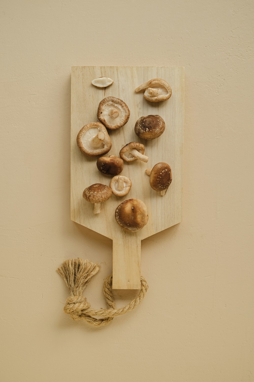 a cutting board with a bunch of mushrooms on it