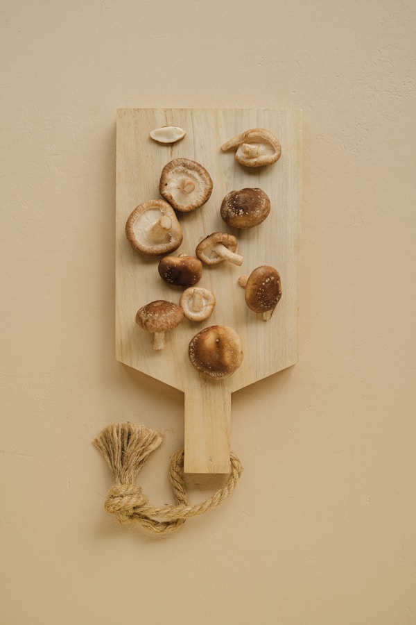 A cutting board with a bunch of mushrooms on it