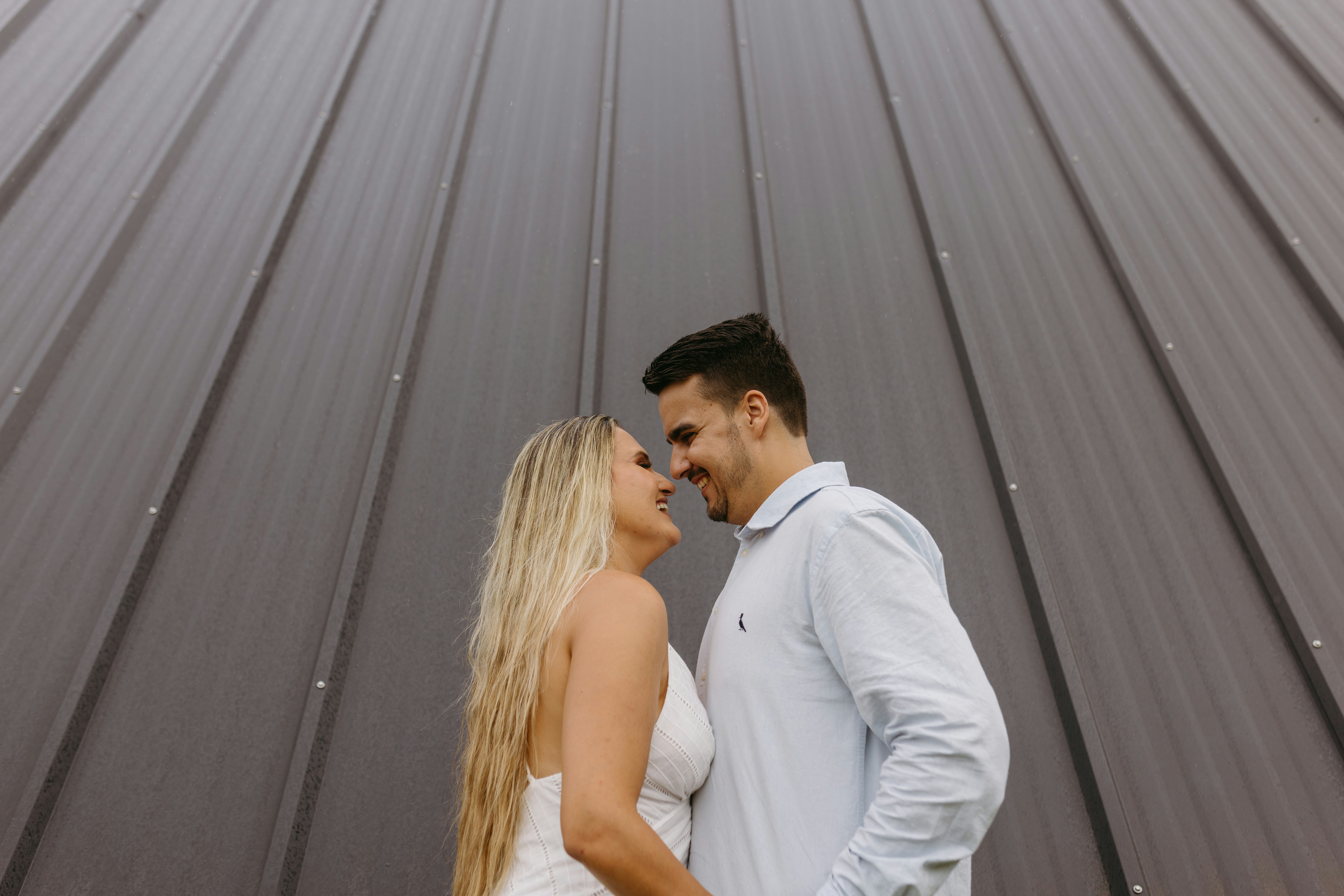 a man and a woman standing next to each other