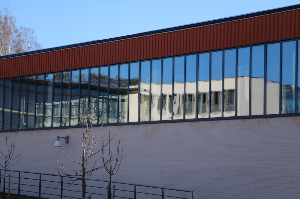 the reflection of a building in the windows of another building