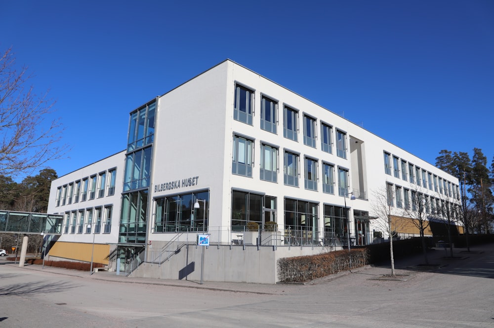 a large white building with lots of windows